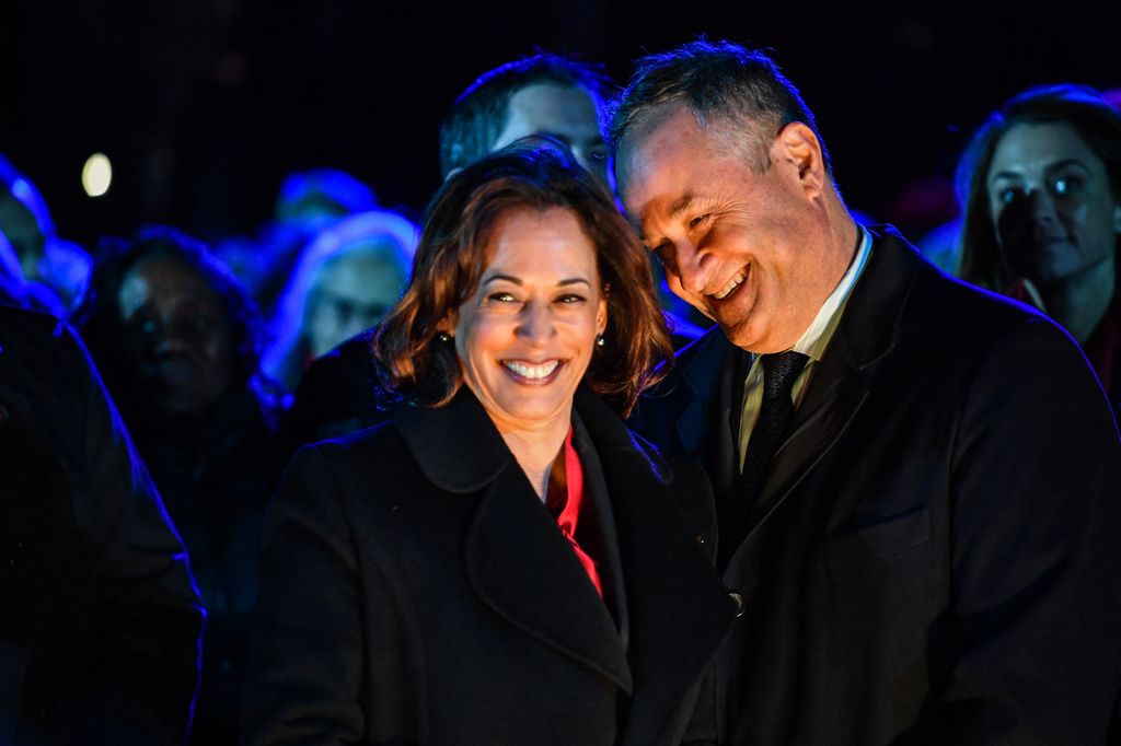 US Vice President Kamala Harris (L) and Second Gentleman Doug Emhoff attend the 100th National Christmas Tree Lighting in 2022