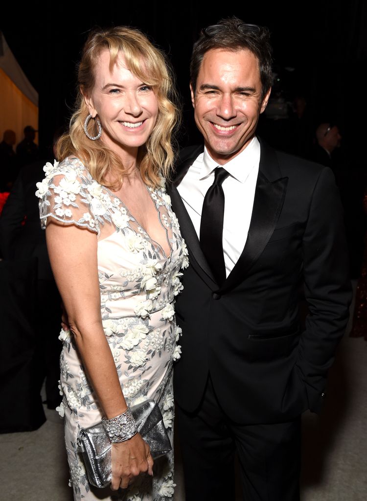 Janet Holden and Eric McCormack and attend the 26th annual Elton John AIDS Foundation Academy Awards Viewing Party sponsored by Bulgari, celebrating EJAF and the 90th Academy Awards at The City of West Hollywood Park on March 4, 2018 in West Hollywood, California