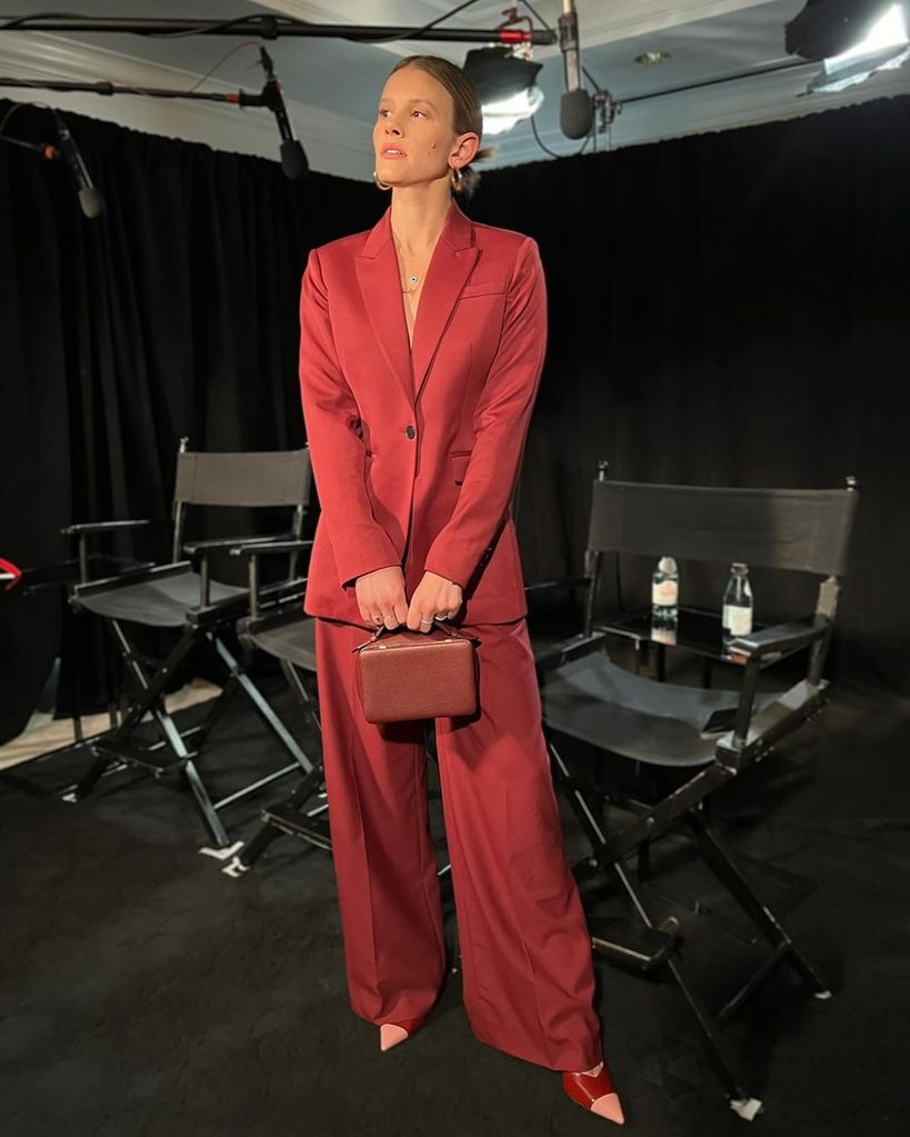 Sosie stuns in bold red suit