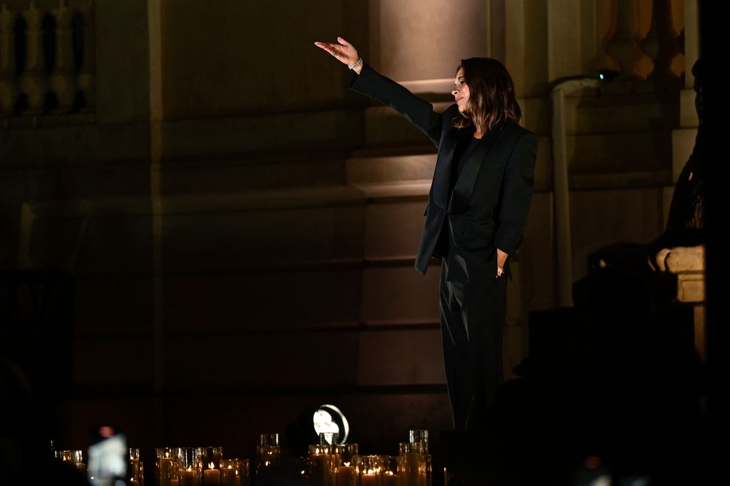 Victoria Beckham greets the audience at the at the end of her collection show for the Women Ready-to-wear Spring-Summer 2025 collection as part of the Paris Fashion Week, in Paris on September 27, 2024