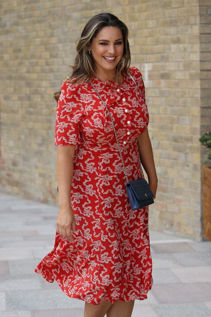 Kelly Brook in red patterned dress with brunette hair leaving Loose Women