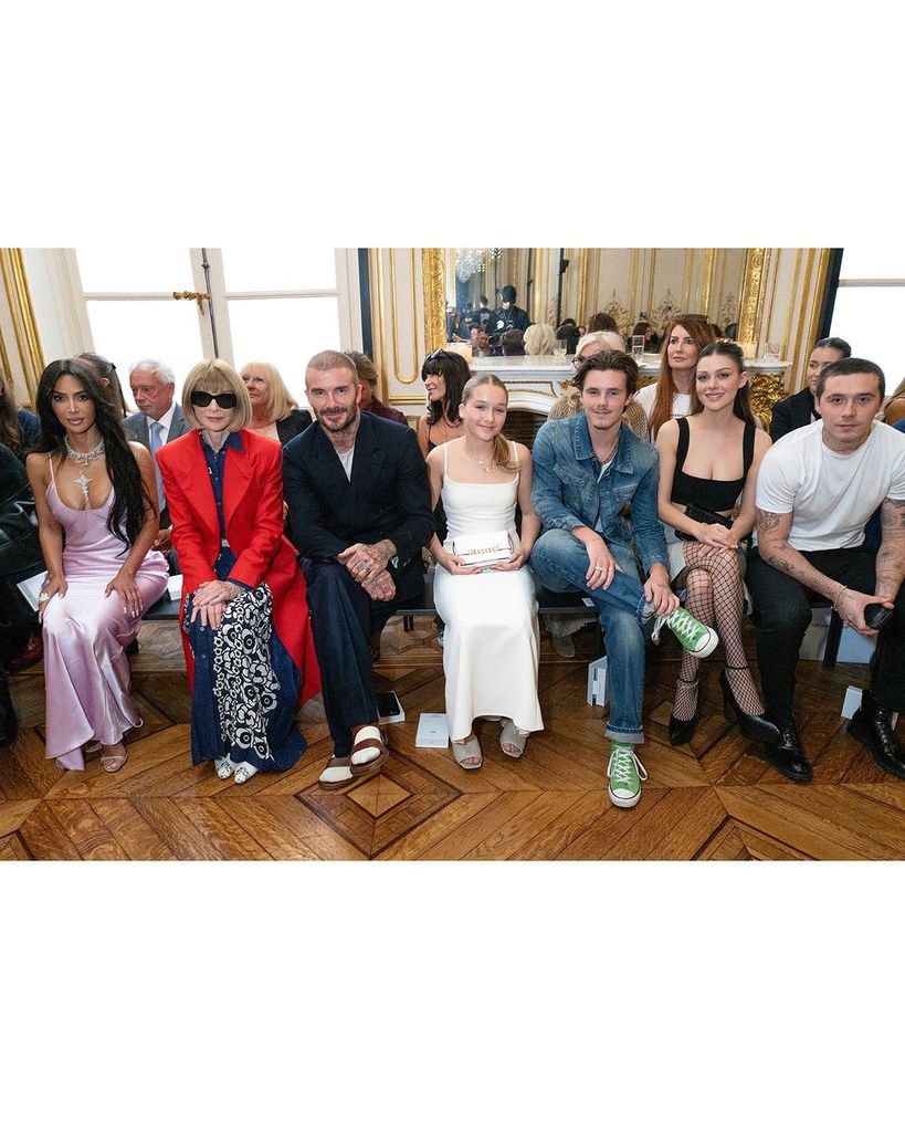 Kim Kardashian, Anna Wintour, David Beckham, Harper Beckham, Cruz Beckham, Nicola Peltz and Brooklyn Beckham on the front row