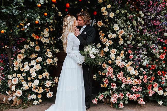 Anna Fowler wedding photo flower wall