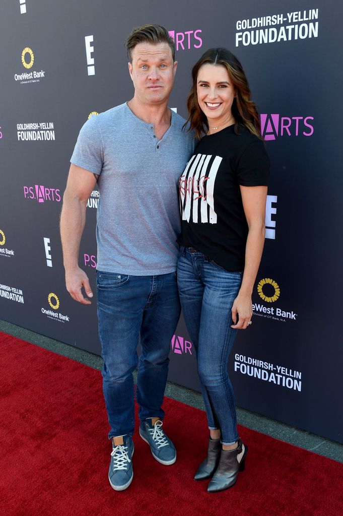 Actor Zachery Ty Bryan (L) and Carly Matros attend P.S. ARTS and OneWest Bank's Express Yourself 2016 at Barker Hangar on November 13, 2016 in Santa Monica, California.