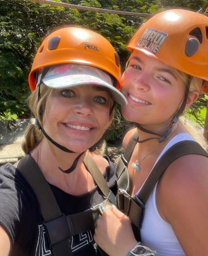 Denise Richards and daughter Lola in orange helmets