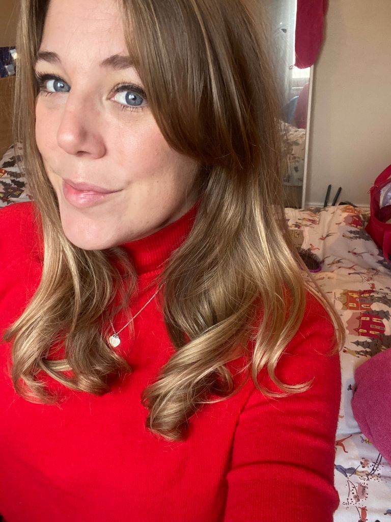 Mel selfie in a red jumper