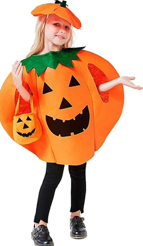 Little girl wearing a orange Halloween pumpkin costume 