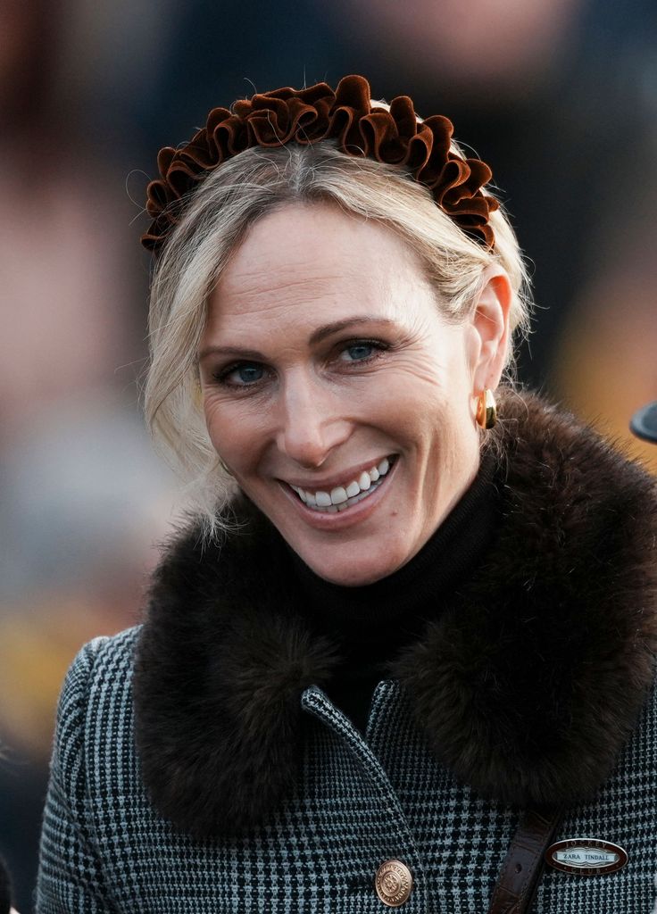 Zara Tindall wears an L.K.Bennett coat and ruffled brown headband