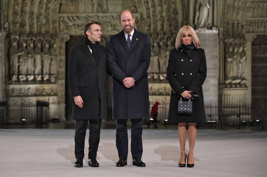 French President Emmanuel Macron (L) and his wife Brigitte (R) welcome Britain's William, Prince of Wales head of a ceremony to mark the re-opening of the landmark Notre-Dame