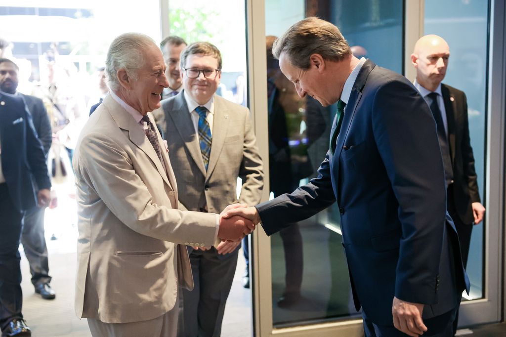 Charles greeting UK Secretary of State for Foreign Affairs David Cameron