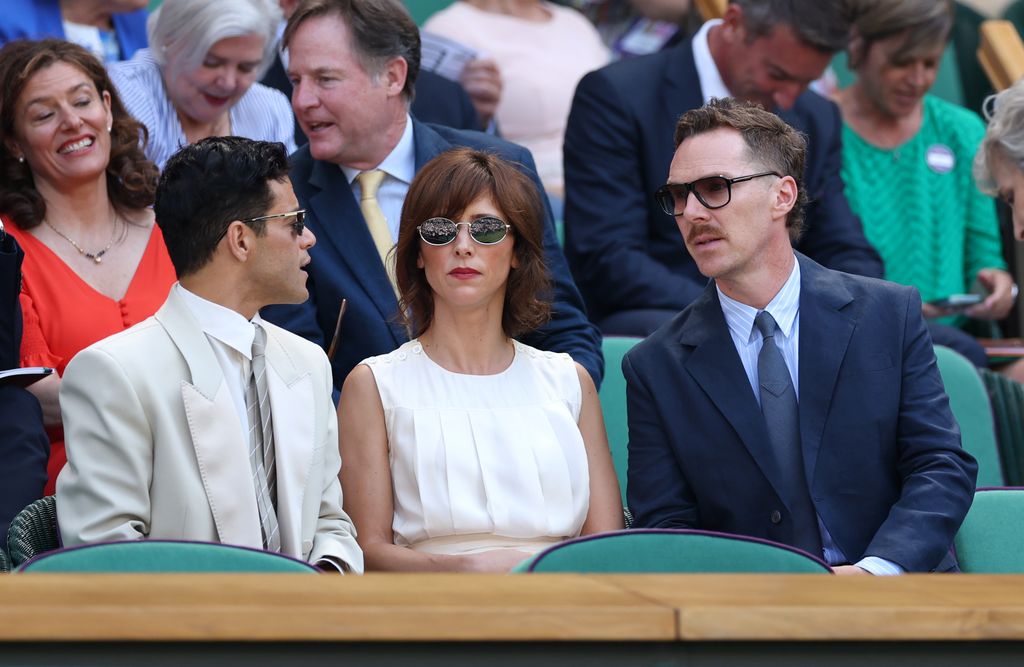 Rami Malek, theatre director Sophie Hunter and actor Benedict Cumberbatch interact in the Royal Box prior to the Gentlemen's Singles semi-finals