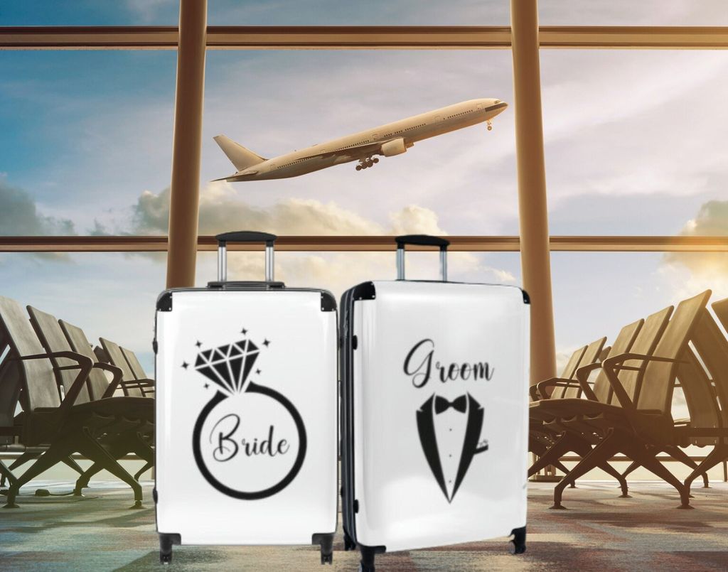 His and her's suitcases for bride and groom