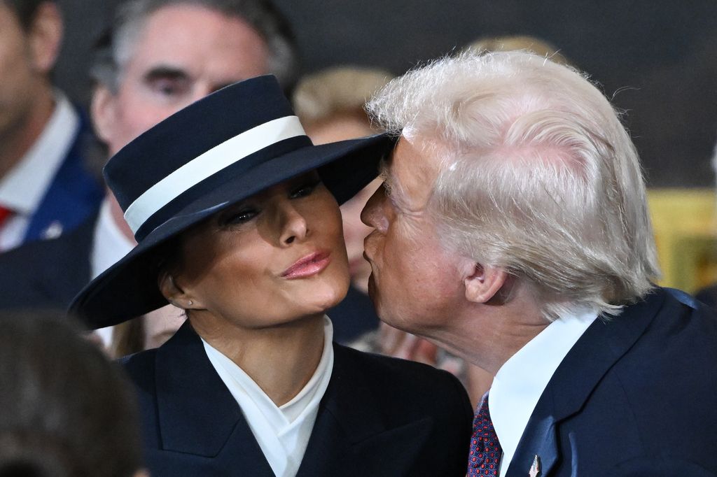 Donald Trump kisses Melania Trump at his inauguration in the U.S. Capitol Rotunda on January 20, 2025 in Washington, DC. Donald Trump takes office for his second term as the 47th President of the United States