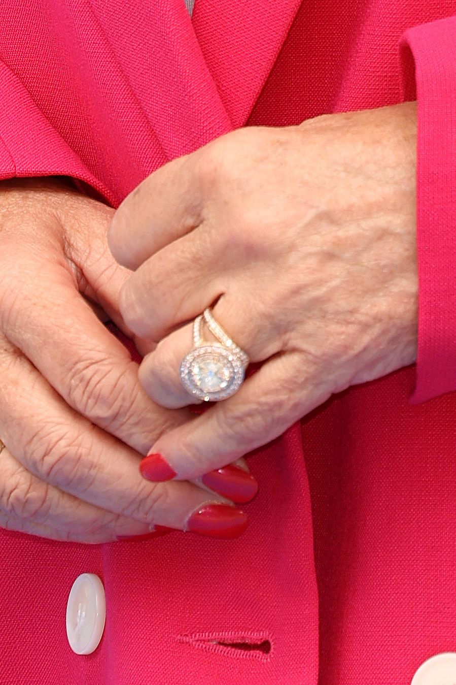 Shirley Ballas in a pink suit with a large ring on her left hand
