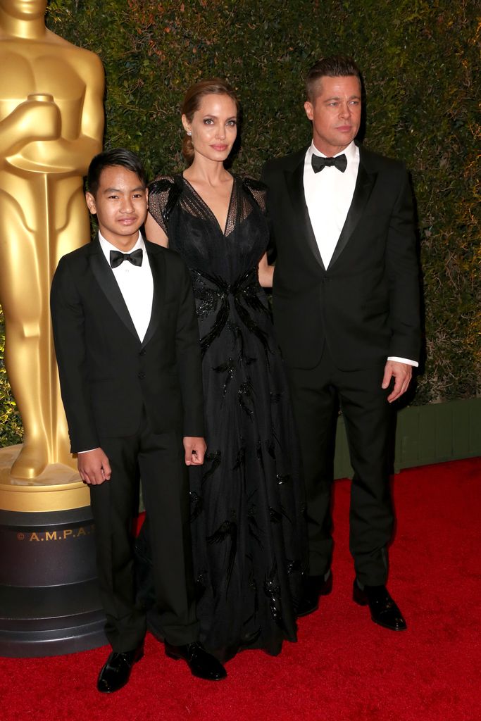 The couple with their Maddox Jolie-Pitt in 2013