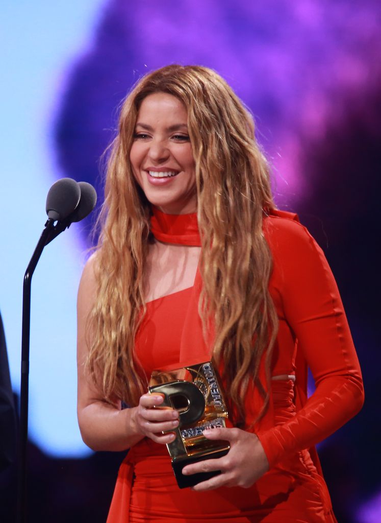 Shakira looks red hot in form-hugging mini dress | HELLO!