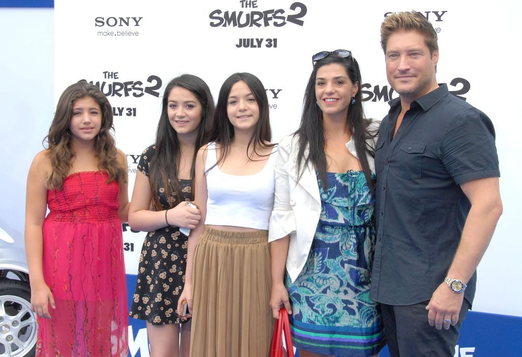 Actor Sean Kanan (R) and wife Michele Vega and their daughters arrive at the Los Angeles Premiere 'Smurfs 2' on July 28, 2013 a