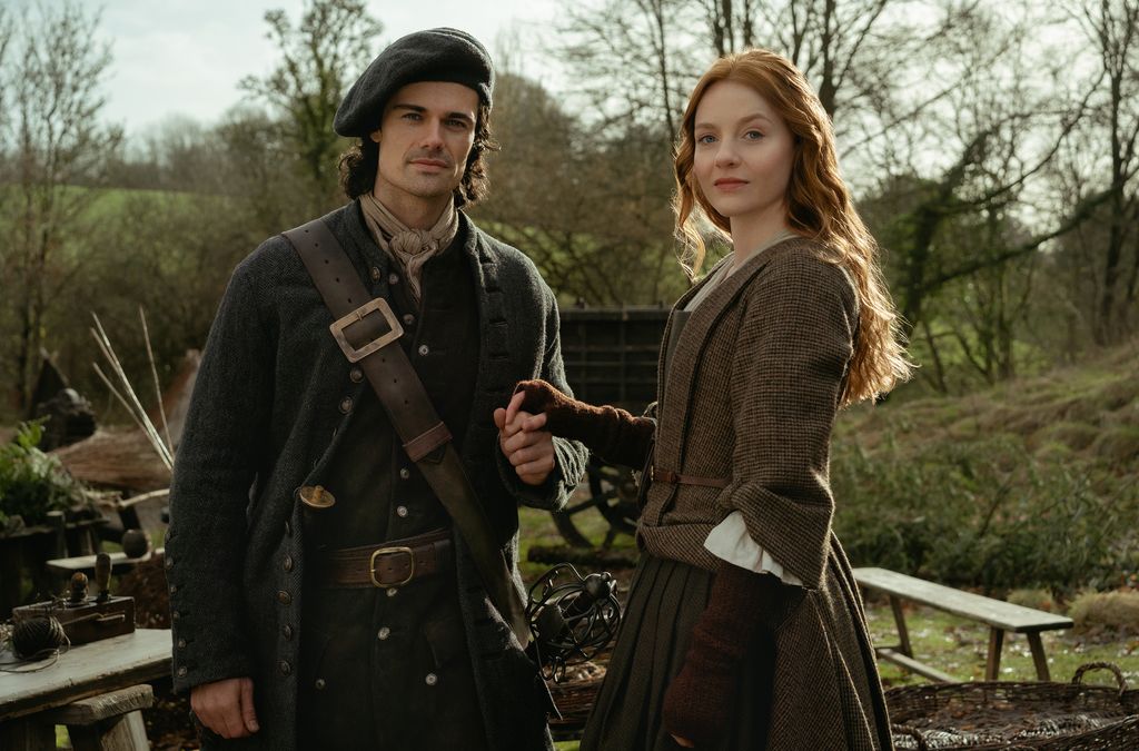 man and woman in 18th century clothing
