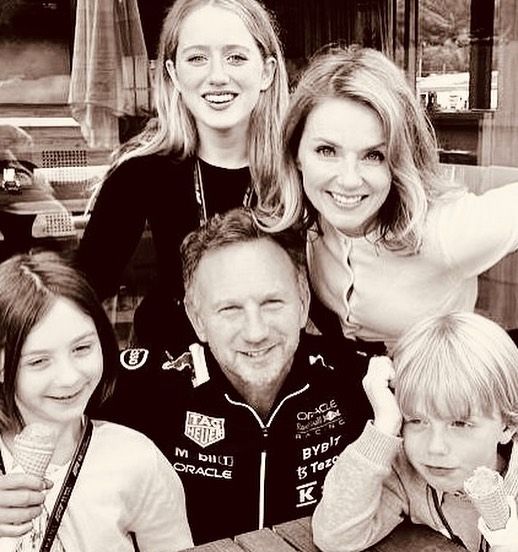 Geri Horner and husband Christian posing for a family portrait with children Bluebell Monty and Olivia