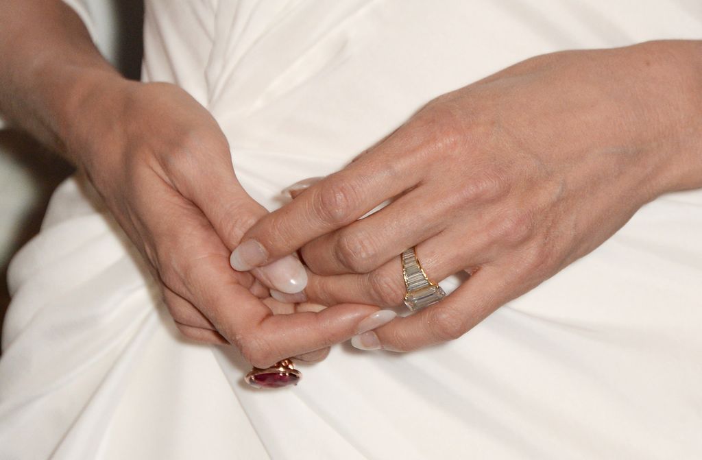Angelina Jolie's hands with rings
