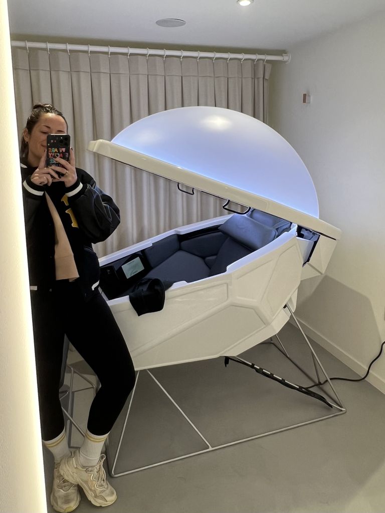 Woman posing with the Somadome pod in Notting Hill