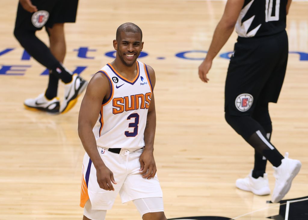 Chris Paul #3 of the Phoenix Suns reacts to his off balance three pointer during Game Four of the Western Conference First Round Playoffs at Crypto.com Arena on April 22, 2023