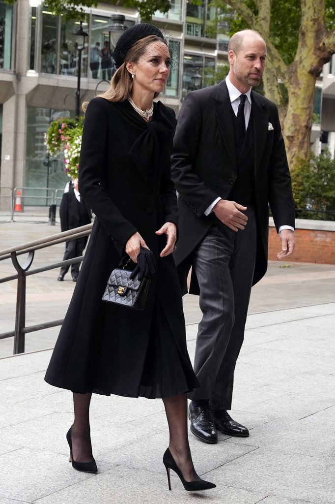 kate walking with william in black outfits