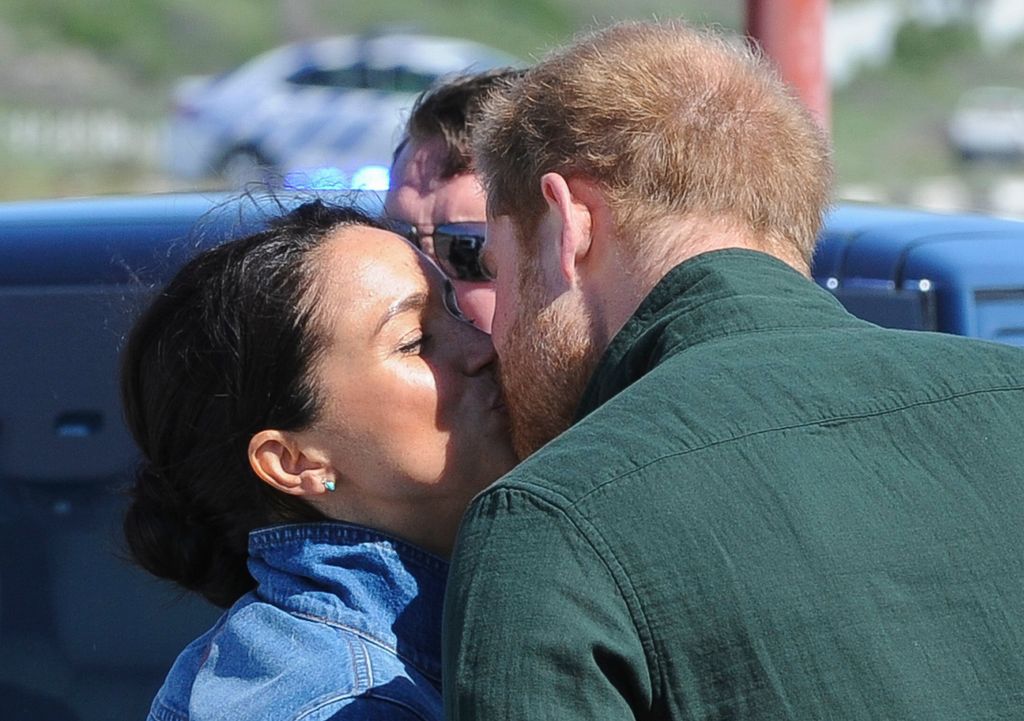 Meghan and Harry kissing in Cape Town on royal tour