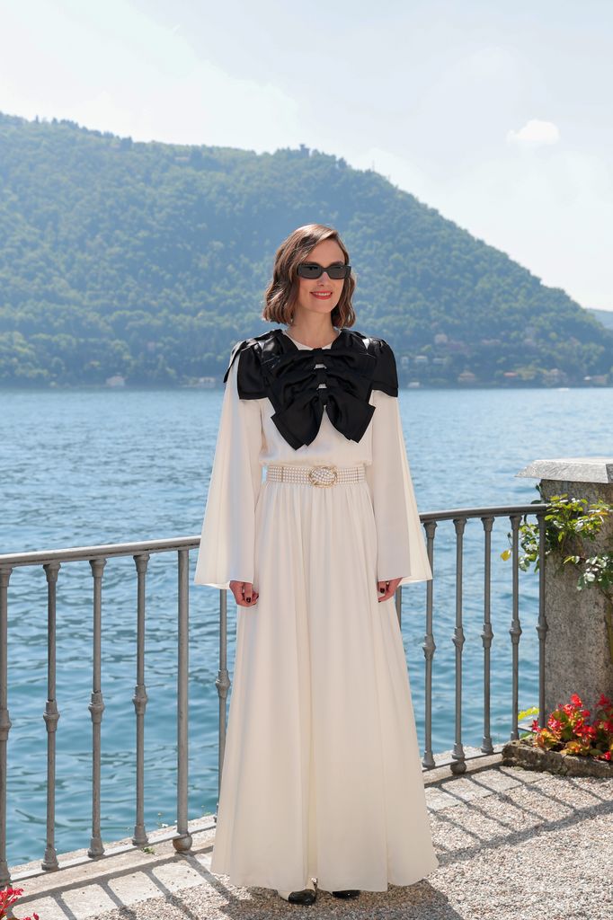 Keira Knightley attends the Chanel Cruise 2025 fashion show in a white maxi gown