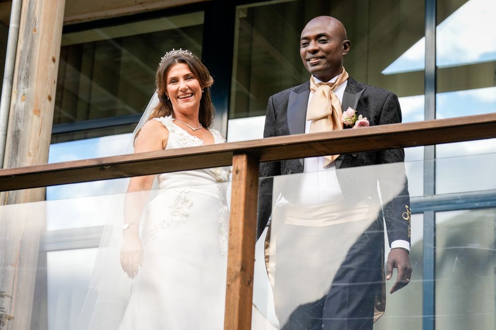 Princess Martha Louise on a balcony with Durek Verrett on their wedding day