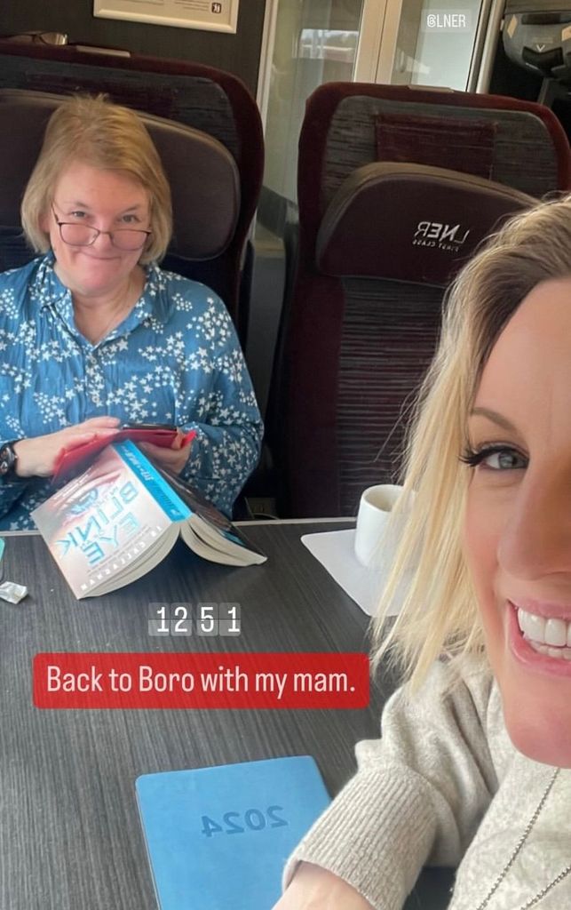 Steph McGovern smiling on a train with her mum