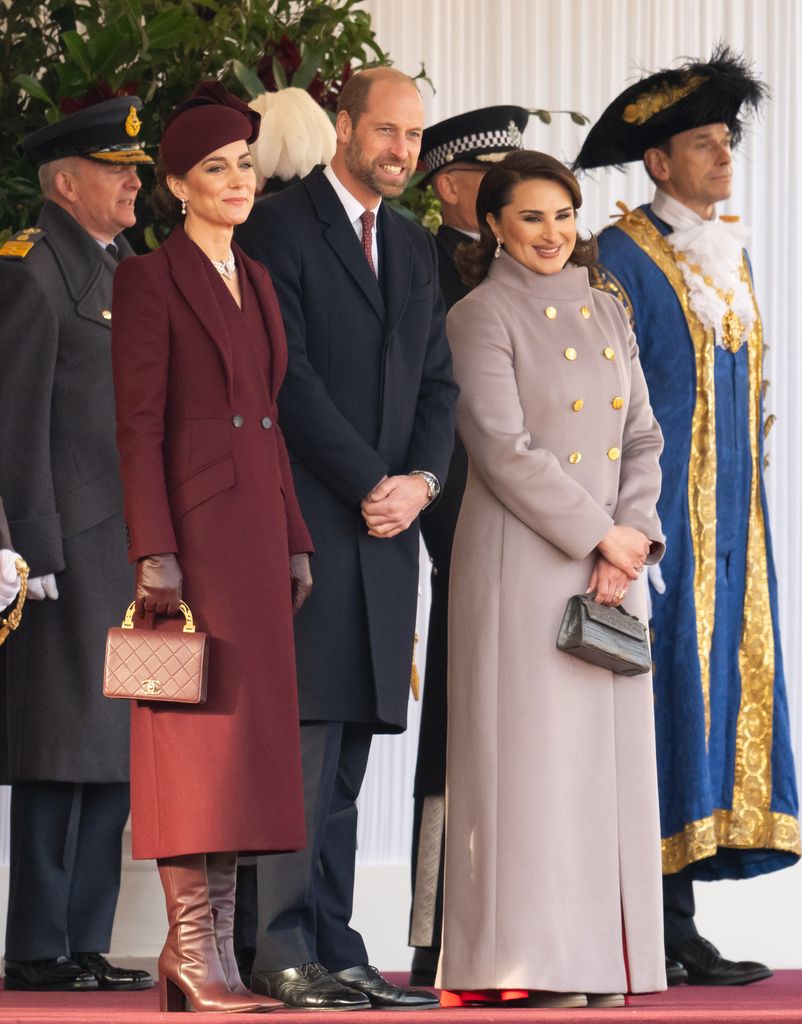 Catherine, William and Sheikha Jawaher in coats