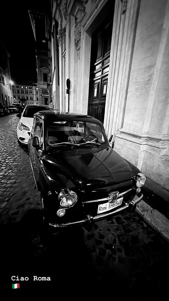 David Muir shares a photo of a street in Rome with a pair of cars parked on his Instagram Stories