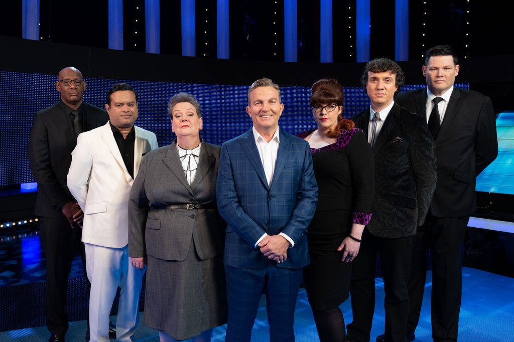 Bradley Walsh with The Chasers:  Shaun Wallace, Paul Sinha, Anne Hegerty, Jenny Ryan, Darragh Ennis and Mark Labbett