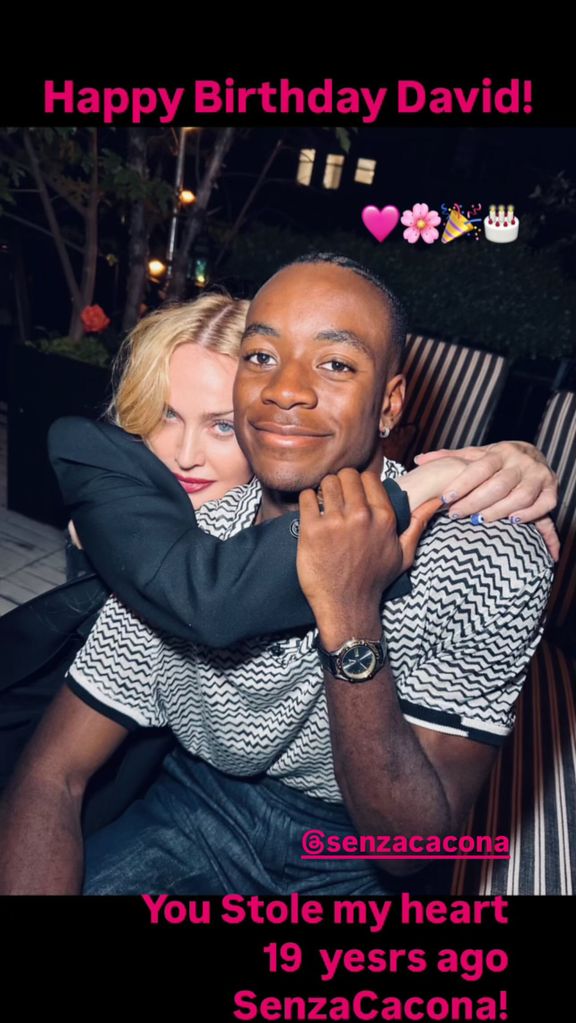 Screenshot of Madonna's Stories with a picture of Madonna hugging son David 