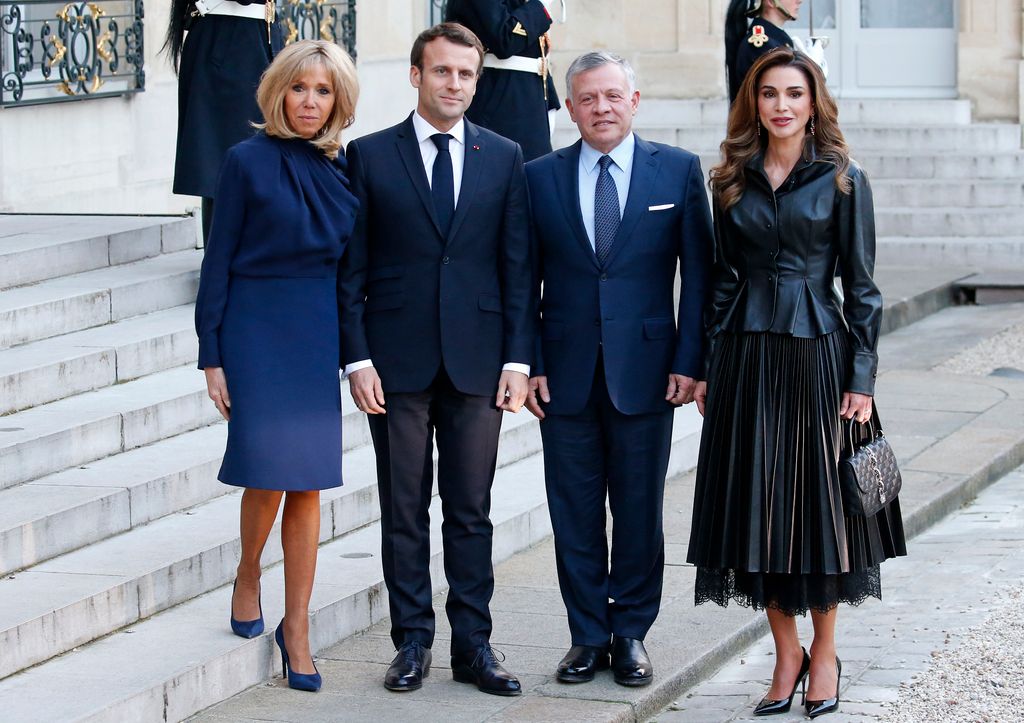 Queen Rania in leather alongside emmanuel Macron and his wife Brigitte and King Abdullah