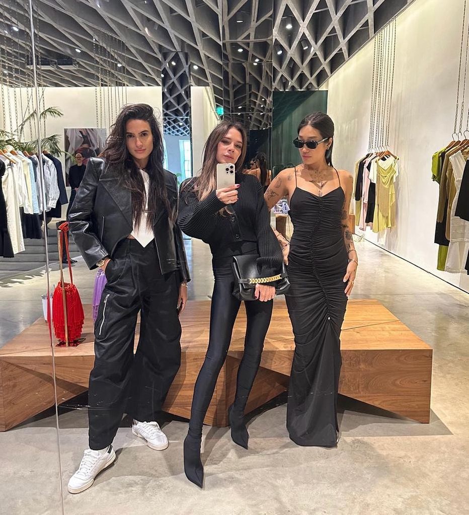 Victoria Beckham posing with Peggy Gou and Isabela Grutman in her Victoria Beckham Dover Street store