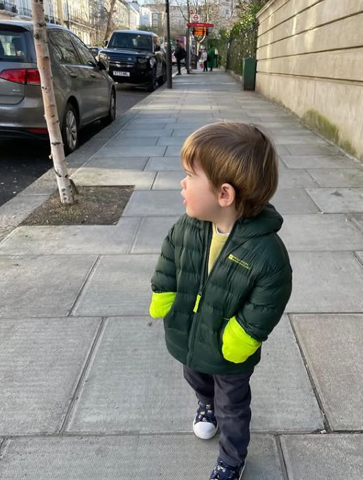 Ernest Brooksbank looking curious on a street