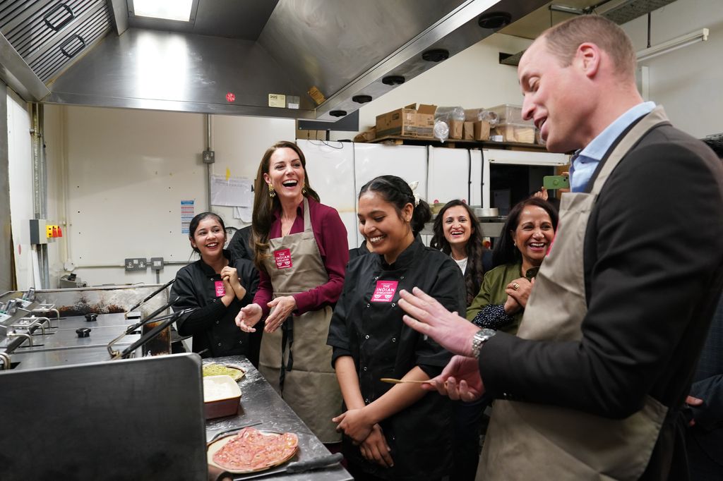 William and Kate help out in the kitchen at Indian Streatery