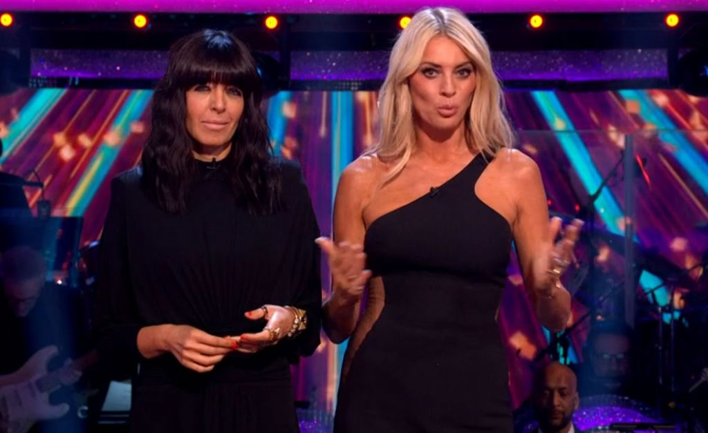 Claudia Winkleman wearing a black dress as she hosts Strictly with Tess Daly