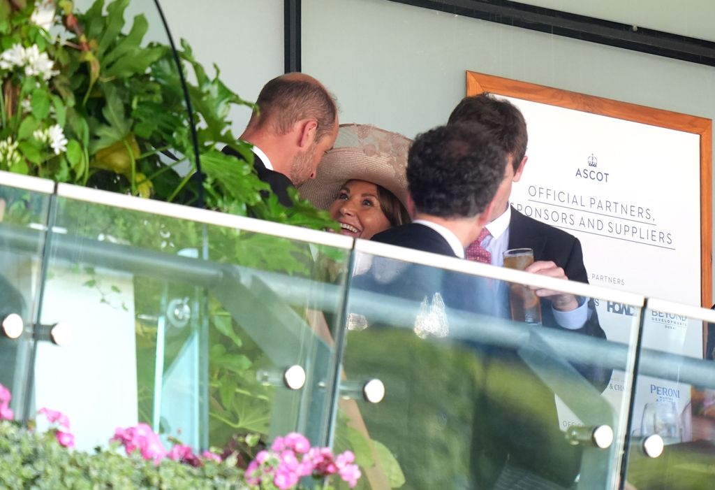 Carole Middleton smiling at Prince William at Royal Ascot