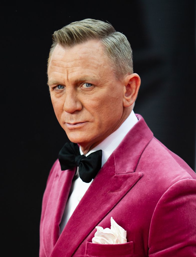 man in pink velvet suit