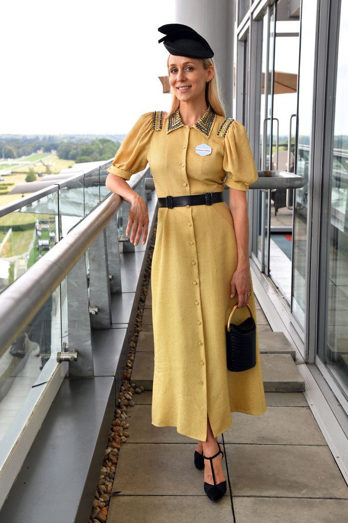  Petrina Hesketh in a yellow puff-sleeve dress with statement shoulders and a black fascinator at Royal Ascot.