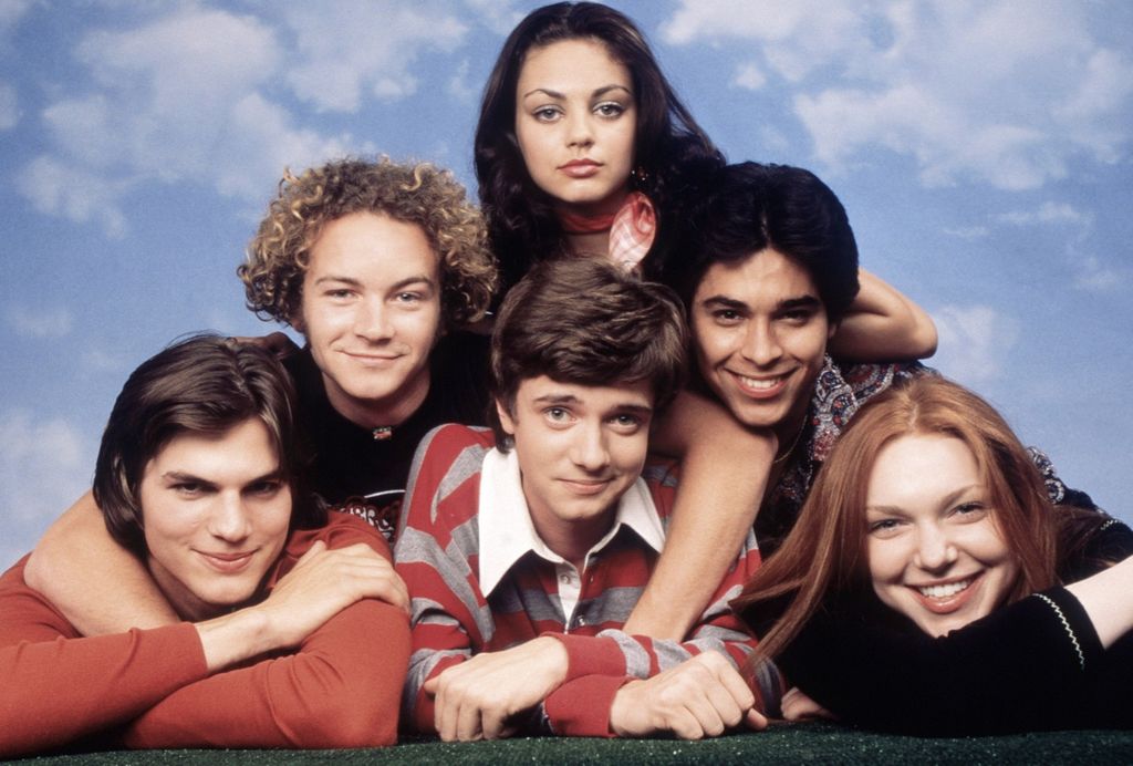 Mandatory credit: TM & © 20th Century Fox. No Merchandising. Editorial Use Only. No Book or TV usage without prior permission from Shutterstock Editorial
Mandatory Credit: Photo by 20thCentFox/Everett/Shutterstock (14501854q)
THAT '70S SHOW, cast photo. Clockwise from bottom center: Topher Grace, Ashton Kutcher, Danny Masterson, Mila Kunis, Wiler Valderrama, Laura Prepon, (Season 2), 1998-2006. ph: Robert Sebree / ©20th Century Fox Film Corp. / courtesy Everett Collection
That '70s Show