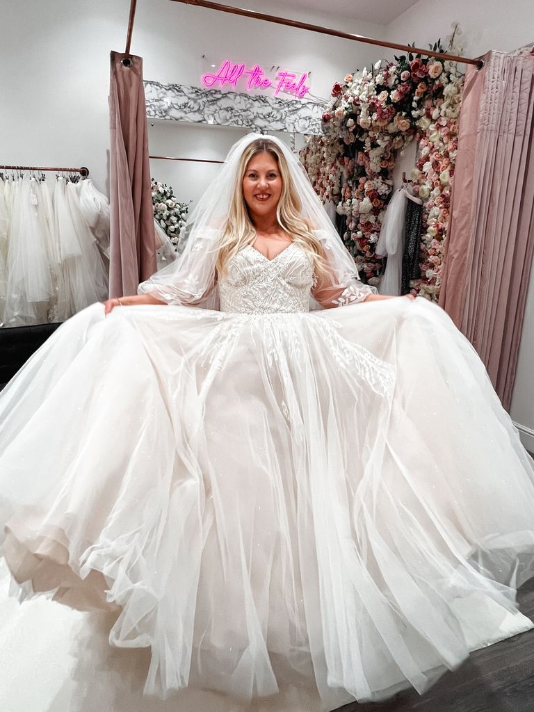 Woman in a flowing white wedding dress