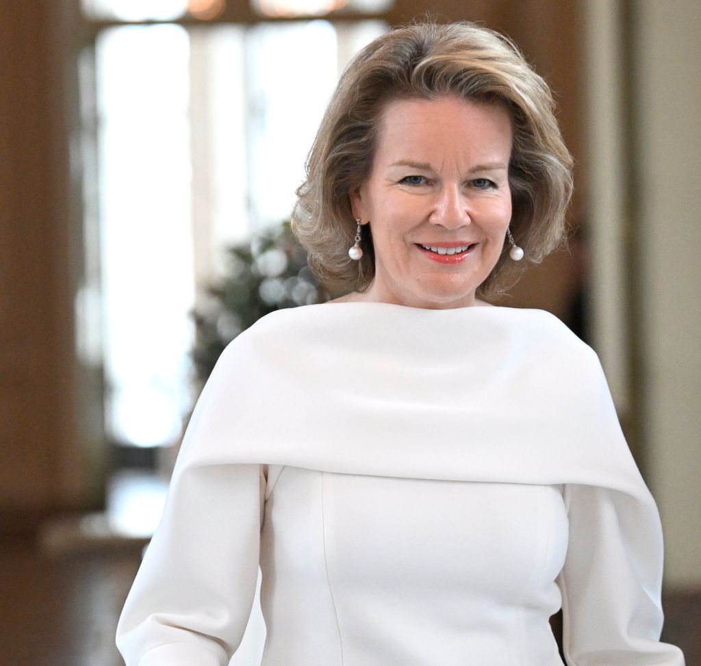 Queen Mathilde waist up in white top