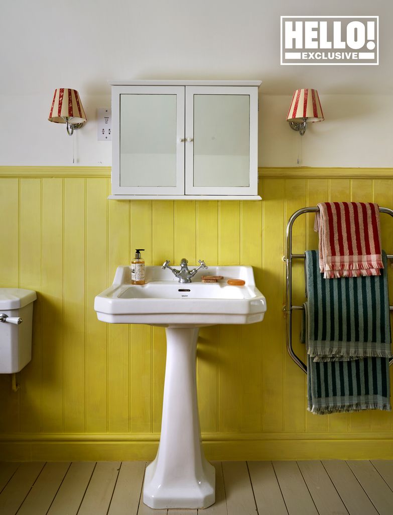 Penelope Chilvers' yellow bathroom at Cotswolds home