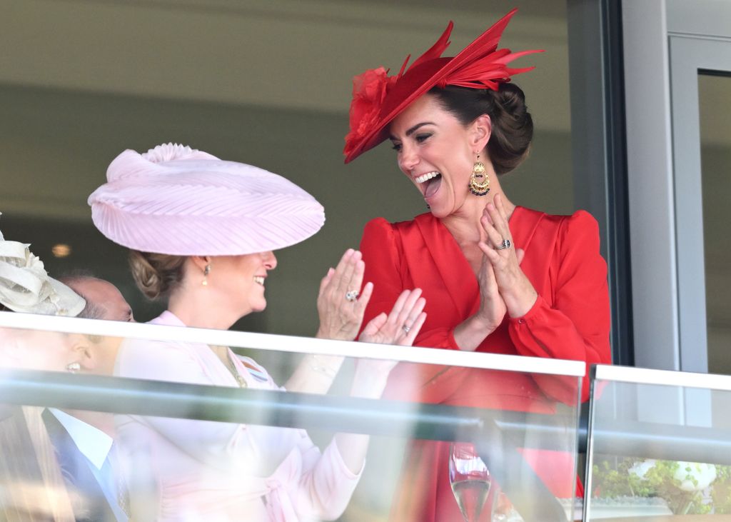 Kate Middleton and Sophie, Duchess of Edinburgh cheer during a race on day four of Royal Ascot 2023 