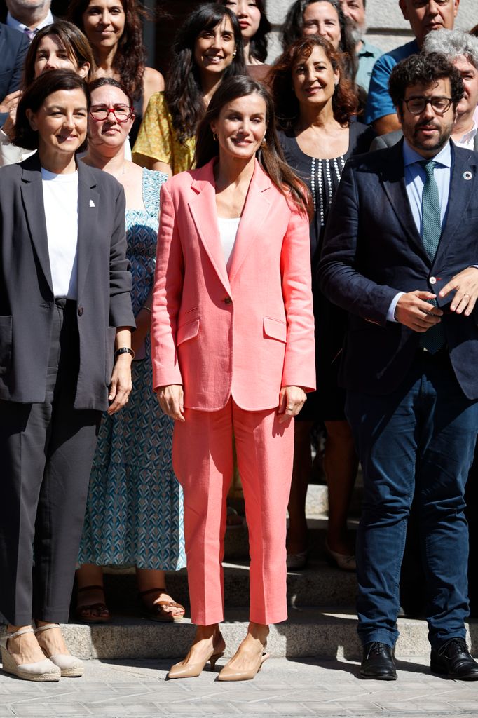 Queen Letizia wearing coral suit