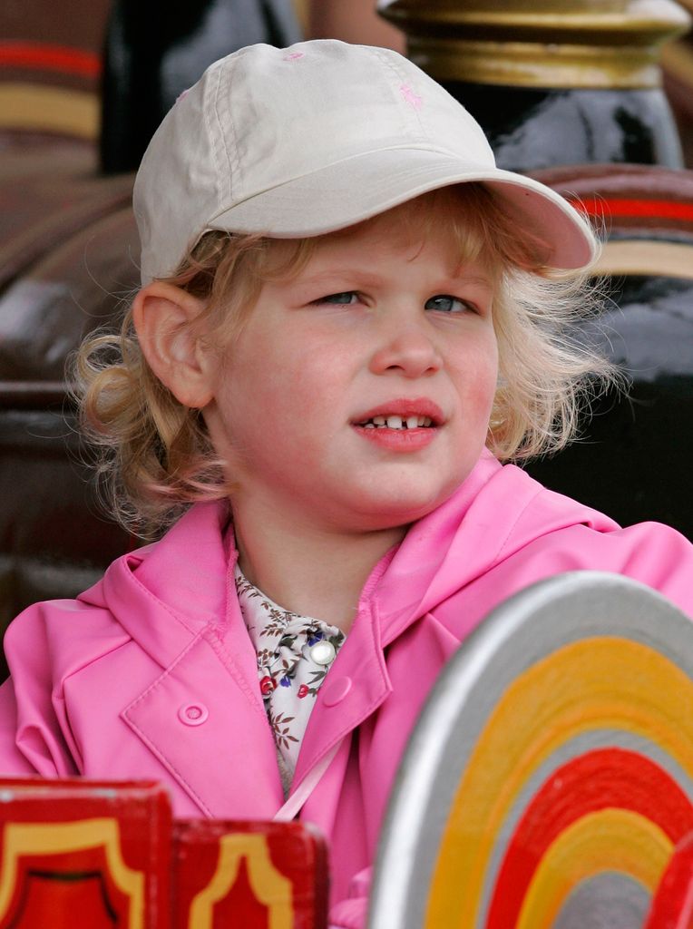 Young Lady Louise Windsor in pink coat and cap
